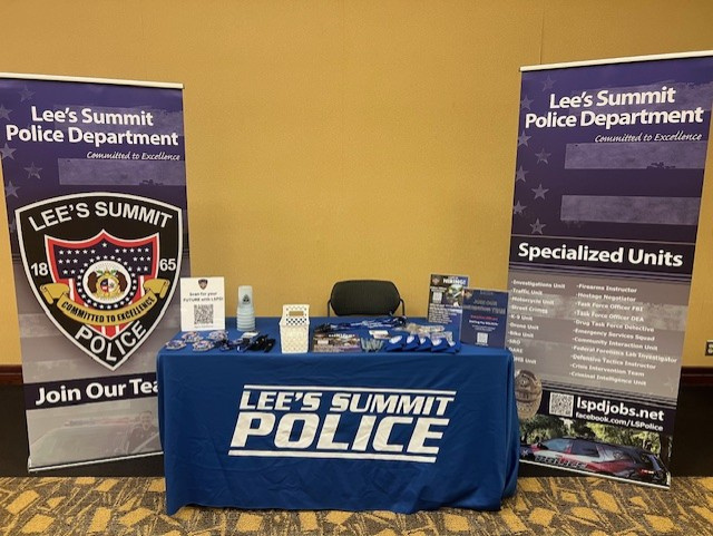 Lee's Summit Police Banner Stands and Table Arrangement for Fair